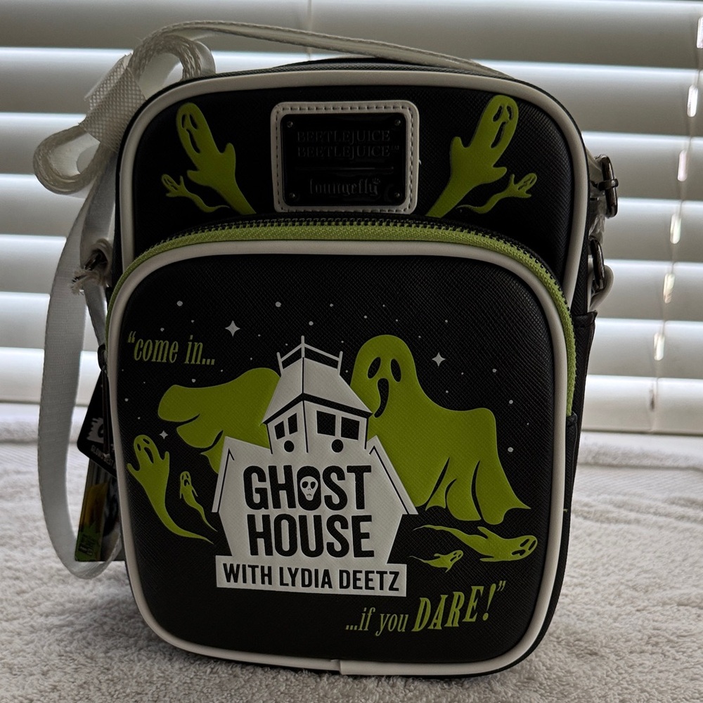 Loungefly Beetlejuice Beetlejuice Ghost House Glow-in-the-Dark Crossbody Bag.